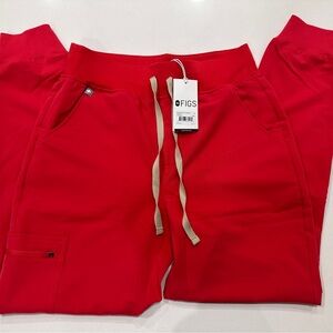 Zamora high waisted joggers;”awesome red” New with tags never worn.